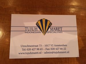 Business card front at Tujuh Maret in Amsterdam