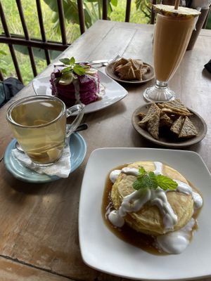 pumpkin pancakes, extra tempe, ginger lemongrass tea, tropical (dragonfruit) pancakes, extra tofu, mango pineapple smoothie  at Vegan Soul Kitchen in Penida Island