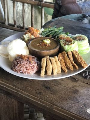 Gado gado great sauce delicious lil cabbage rolls and veg crackers!! at Vegan Soul Kitchen in Penida Island