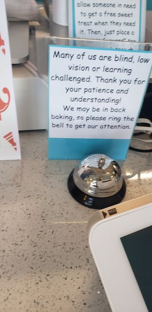 Sign at the checkout, love that they hire special needs staff at Carina's Bakery in Beaverton