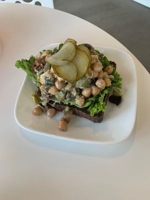 Open faced chickpea salad sandwich  at Carina's Bakery in Beaverton