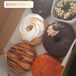 Donas surtidas: chocolate laney, banana sin gluten, pie de limón, moka, pb&j y crème brûlée at Donut Corp - Nueva Los Leones in Santiago