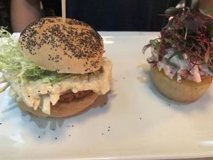 Vegan burger with hoisin sauce served with red cabbage coleslaw and roasted potato at Bon Lloc in Mallorca