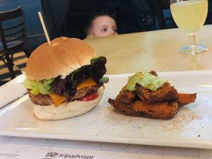 The super tasty burger and sweet potato chips. at Bon Lloc in Mallorca