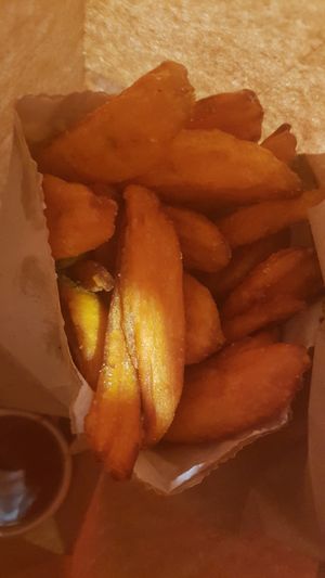 Hot large sweet potatoes fries $7. It's crispy on the outside and soft inside at Soul Burger in Newtown