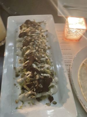 SHAVED BRUSSELS SPROUTS
smoked mustard, pumpkin seeds, crispy shiitake at Fancy Radish in Washington