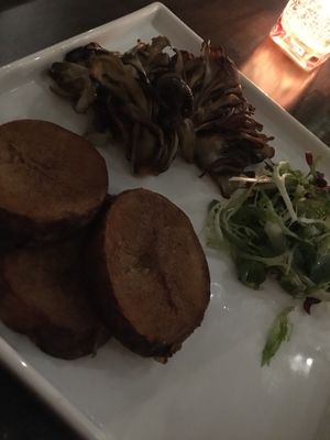 Trumpet mushrooms with potatoes and greens  at Fancy Radish in Washington