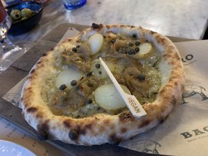 Confit potato and caramelised onion pizzette  at Salt House Bacaro in Liverpool