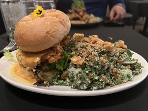 Chipotle Chicken burger with Kale Caesar salad  at The Vegan Hippie Chick in Welland