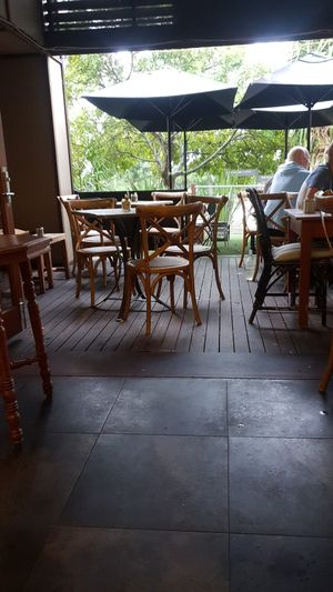 Indoor and outdoor seating at Little Cove Coffee Co in Noosaville