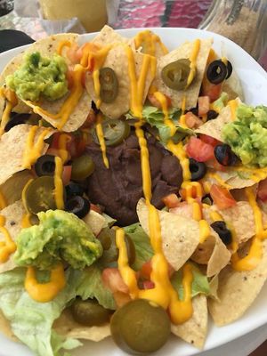 Fully loaded vegan nachos at Martha's Cafe Belize in Belize City