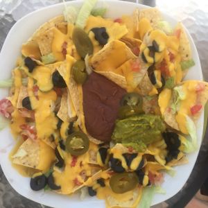 Loaded vegan nachos at Martha's Cafe Belize in Belize City