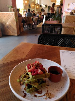 Delicious Vegan matcha avocado waffles at Karibu Cafe in Utrecht