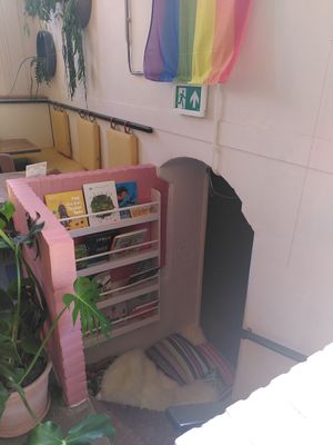 Cosy children's corcer with books etc at Karibu Cafe in Utrecht