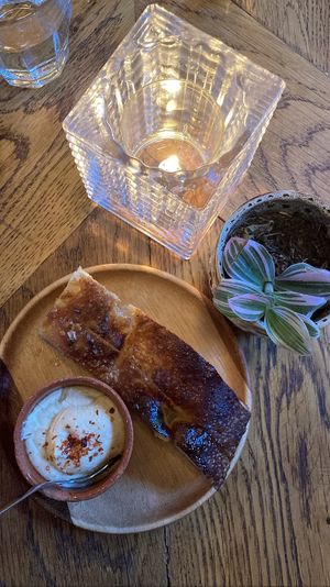 Free: Homemade focaccia with hummus. Fluffy and flavorful  at Karibu Cafe in Utrecht