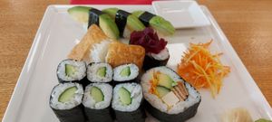 Rice and Avocado, a giant rice ball, more rice and Avocado, rice with a couple of beet peices o  TOP, and only one good mixed sushi piece. All this for 28 CHF, which is $49 CAD. at Cafe im Kunstmuseum in Vaduz