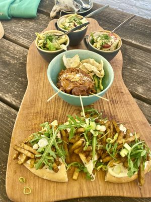 Second round high tea: pasta pesto salad, gado gado chicken and flatbread with shoarma  at Black & White Kafe in Breda