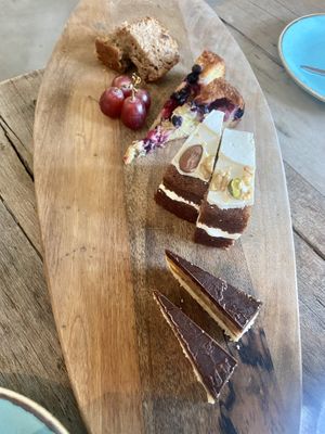 Third round high tea: banana bread, berry cheesecake, carrot cake and a chocolate date pie  at Black & White Kafe in Breda