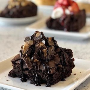 Fudgy-Style Brownies with House-made PB Cups & Chocolate Sauce! at Cinnaholic in Henderson