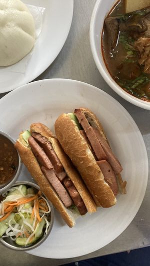 Vegan sausage baguette and baos  at Ahaa Boer Vegetarian Food in Battambang