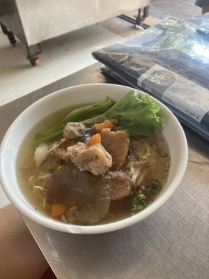 Yellow noodle soup   at Ahaa Boer Vegetarian Food in Battambang