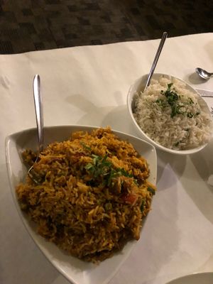 Vegetable Biryani and plate of white rice  at Shahi Palace in Sioux Falls