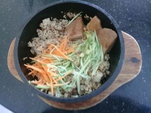 Stone pot rice with bbq sauce....and bit of the fake meat stuff at Monorom Garden in Battambang