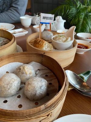 Foreground: Steamed Mushroom and Corn Dumplings.

Background: Plant-based
Dim Sum Platter at Empress in Central Singapore