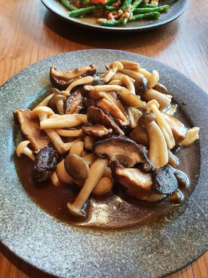 Three mushrooms stir fried at Empress in Central Singapore