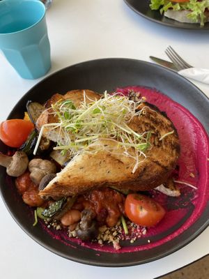 Hippie bowl with house beans, roast zucchini, betrothed hummus and sourdough  at The Foreshore in Nightcliff