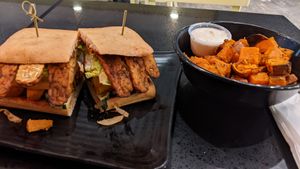 Smoked tempeh sandwich with sweet potato side at Copper Branch in Edmonton