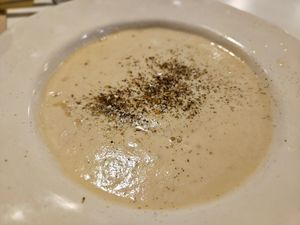 Beans, looks a bit bland but was extremely tasty! Soft, juicy beans with an excellently creamy sauce. 5 stars! at Vegani in Sevilla