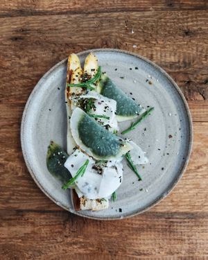white asparagus | kohlrabi seaweed ravioli | no waste furikake at Yerba in Amsterdam