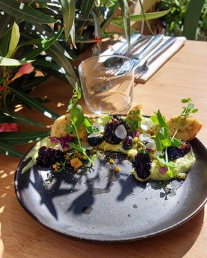 avocado pea skin custard | blackberry | blueberry | meadowsweet | pistachio cookie at Yerba in Amsterdam