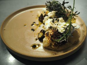 Cauliflower, crispy sprouts, truffle, mustard leaf at Yerba in Amsterdam