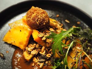 Pumpkin, mole, pickled, roasted,bitterbal, miso and mustard leaf  at Yerba in Amsterdam