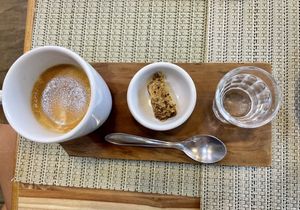 Espresso. And as it is served in Rio, with tonic water and a piece os cake at Vida Bistro in Rio De Janeiro
