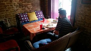 Fun seats in the window. at Bennachin in New Orleans