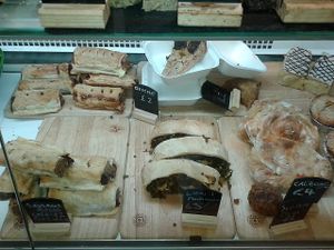 Sausage rolls, quiche, lentil roulade and calzone at The Green Guerrilla Deli in Durham