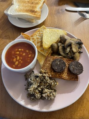 This is the Vegan - really tasty square sausage and Haggs was perfect! Totally stuffed I’d make a point of always going here whenever I’m in Glasgow   at Brooklyn Cafe in Glasgow