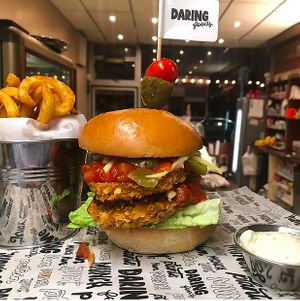 Doubled up cornflake crusted plant-based fillets layered with salsa, cheese and jalapeños. at Brooklyn Cafe in Glasgow