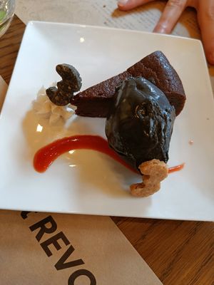 Delicious chocolate cake and black sesame ice cream at Premarché Alternative Diner in Kyoto