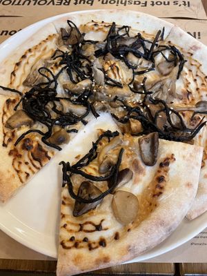 Vegan mushroom hijiki pizza  at Premarché Alternative Diner in Kyoto
