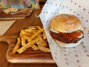 Avocado burger and fries at Premarché Alternative Diner in Kyoto