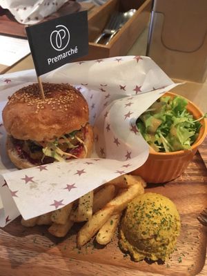 Burger set with salad, fries, and curry hummus. at Premarché Alternative Diner in Kyoto