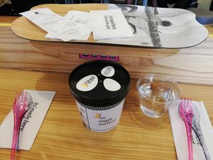 veggie rice bowl, and the charging ports at Itsu - Camden in North West London