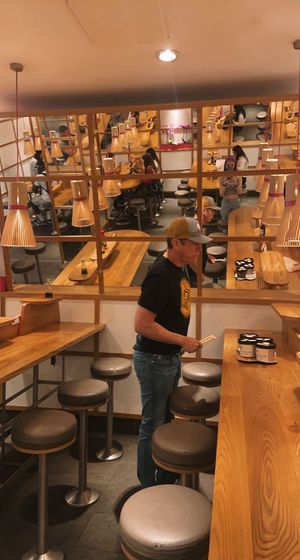 seating area downstairs   at Itsu - Neal St in London