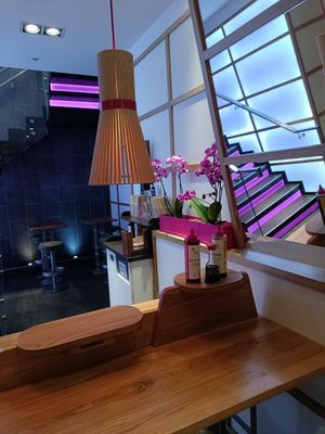 Downstairs seating area at Itsu - Neal St in London