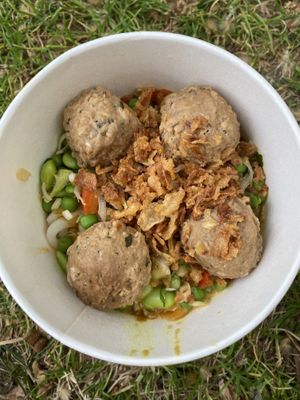 Katsu Curry Stir-Fry Style Udon Noodles (with added Veggie Meatballs)  at Itsu - Piccadilly in London