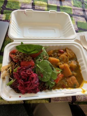 Pumpkin curry with quinoa salad  at All Nations Vegan House in North London